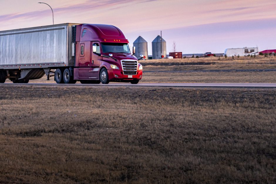 Semi Truck On the  Rural Trans-Canada Highway at sunset.
